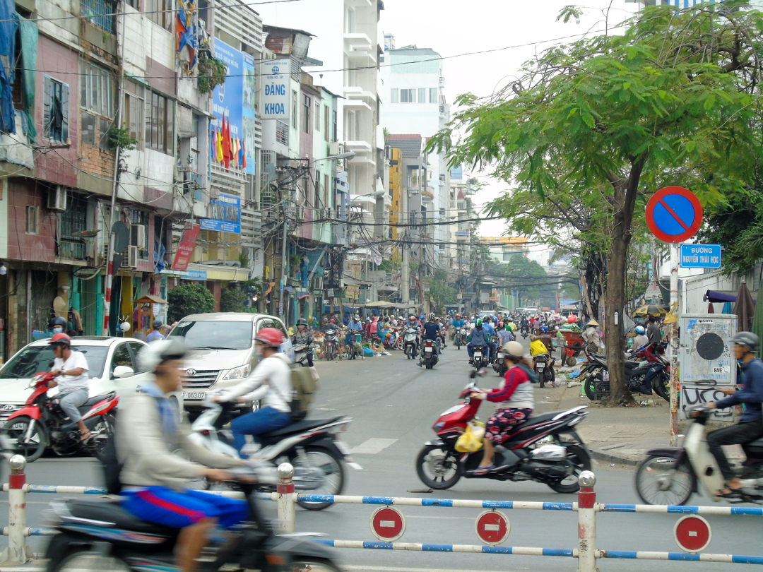 The hustle and bustle of a busy caotic vietnam street. Picture by Ian Russell (charityneeds.com).